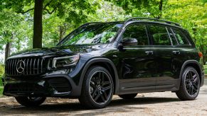 A black 2021 Mercedes-AMG GLB 35 in a forest parking lot