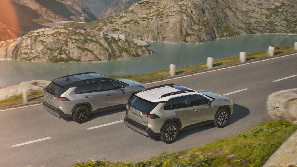 Two 2021 Toyota RAV4 compact SUV models drive on a road, they crush the Ford Escape, according to U.S. News.
