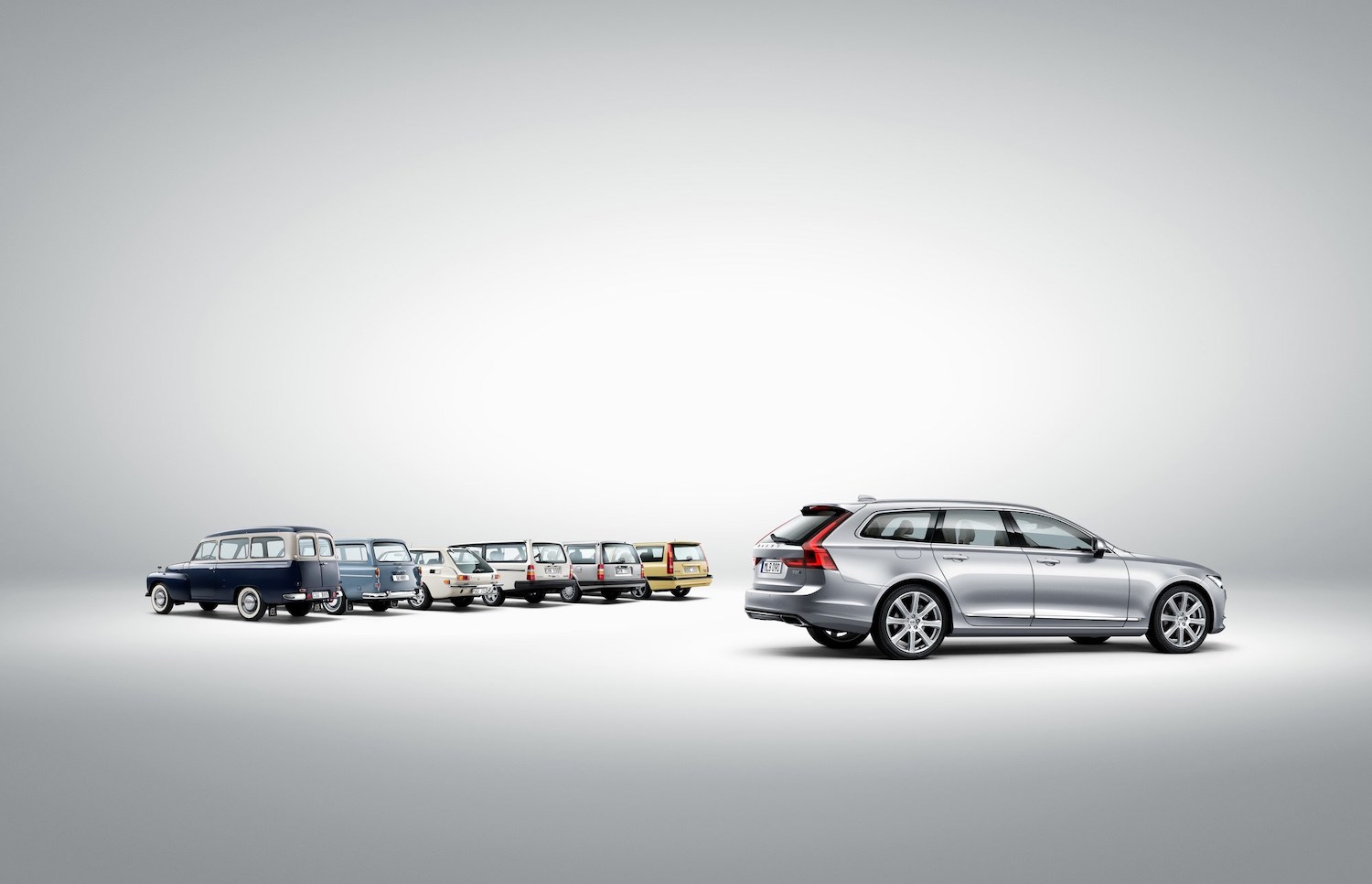 This is a publicity shot of the canceled 2021 Volvo V90 station wagon and its predecessors. | Volvo