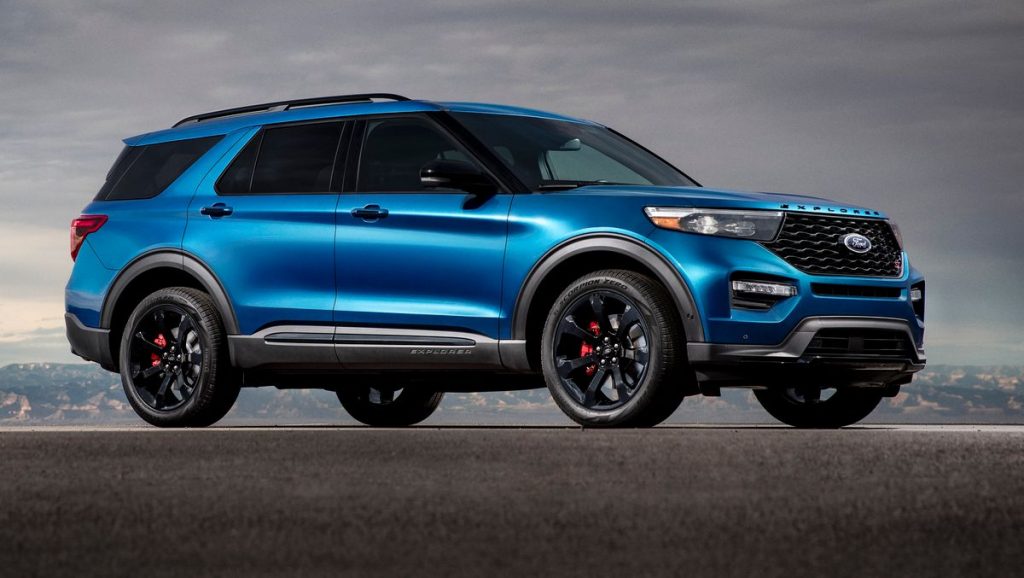 A blue 2021 Ford Explorer SUV, the Electric EV version is delayed unitil 2024 because of the Mustang Mach-E demand.