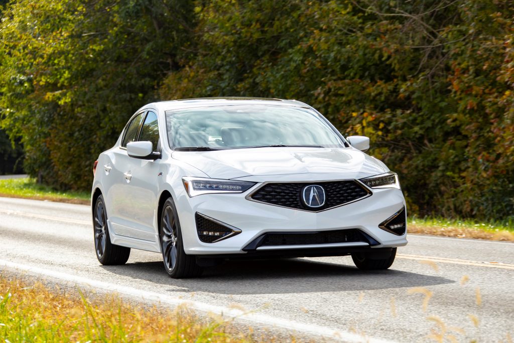 A white 2022 Acura ILX luxury car shot from the front 3/4