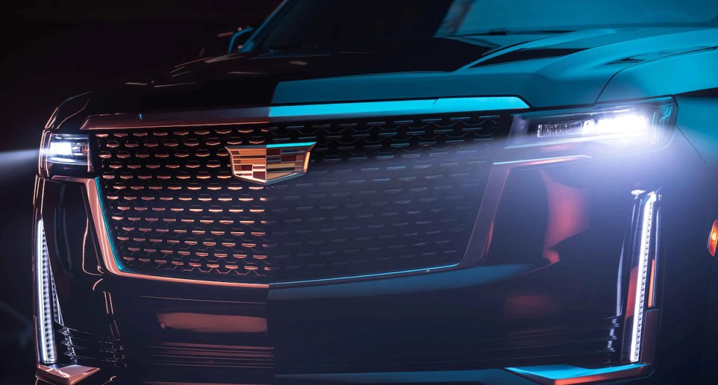 A black 2022 Cadillac Escalade front grille with LED headlights turned on, is it worth more than $100,000?