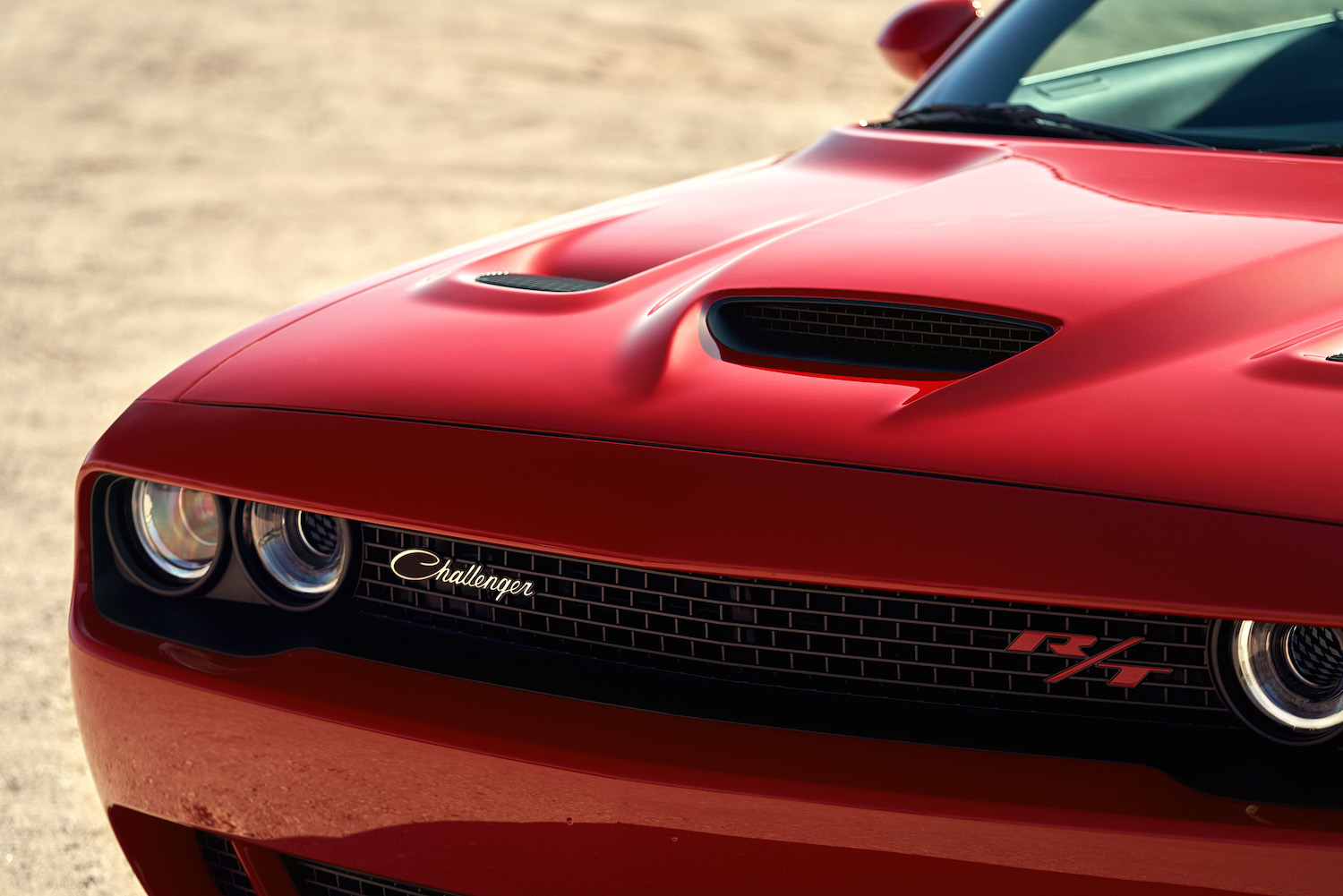 Red coupe. The 6-speed manual makes this 2022 Dodge Challenger R/T a worthy trim level | Stellantis