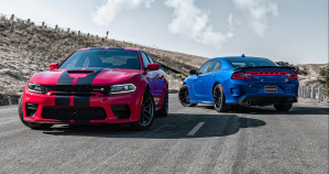2022 Dodge Charger Scat Pack Widebody muscle car models in red and blue paint color options