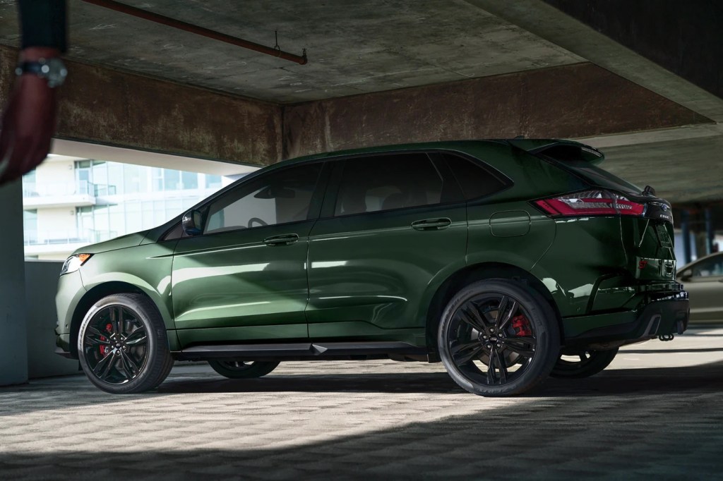 A green 2022 Ford Edge ST, the performance model of the midsize crossover SUV. 