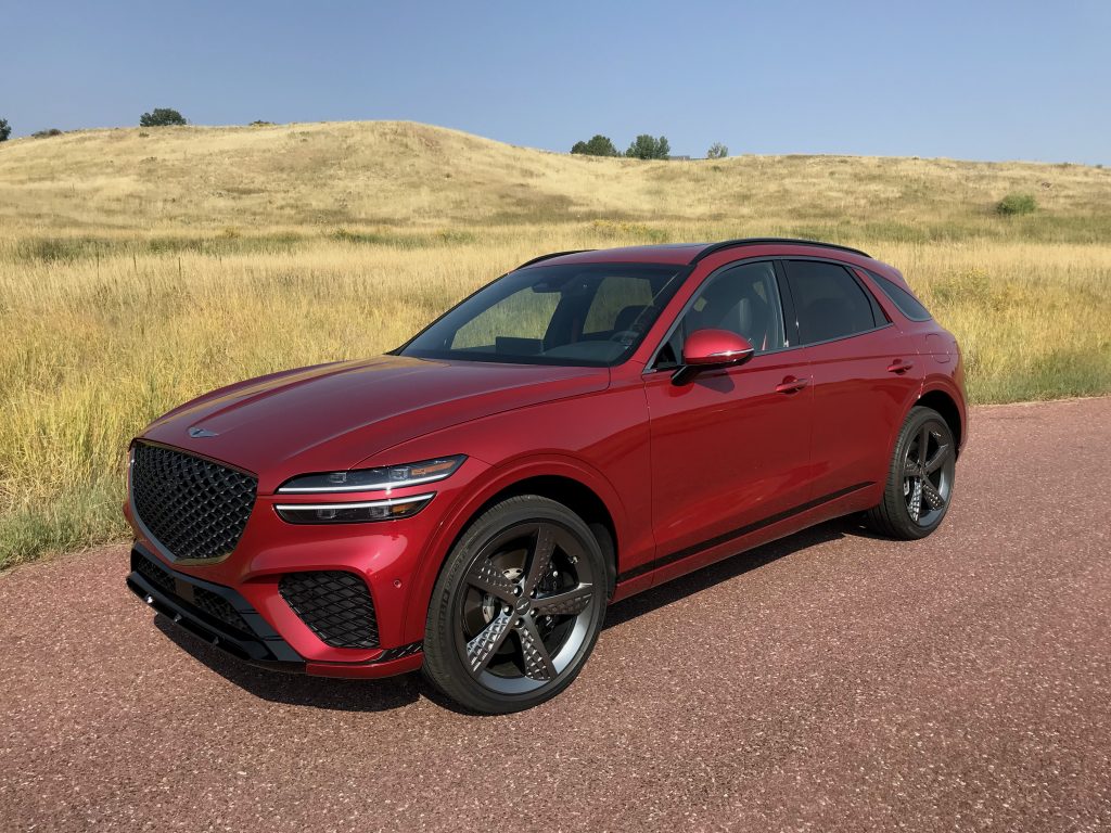 The 2022 Genesis GV70 shown in red, photographed for our full review.