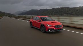 A red 2022 Subaru WRX shot from the front 3/4