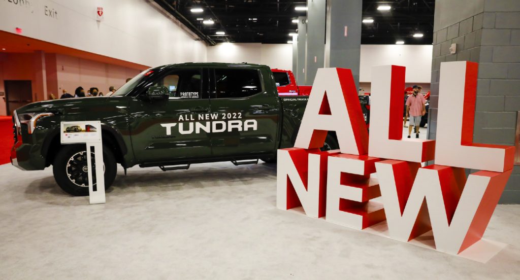 A black 2022 Toyota Tundra is on display. 