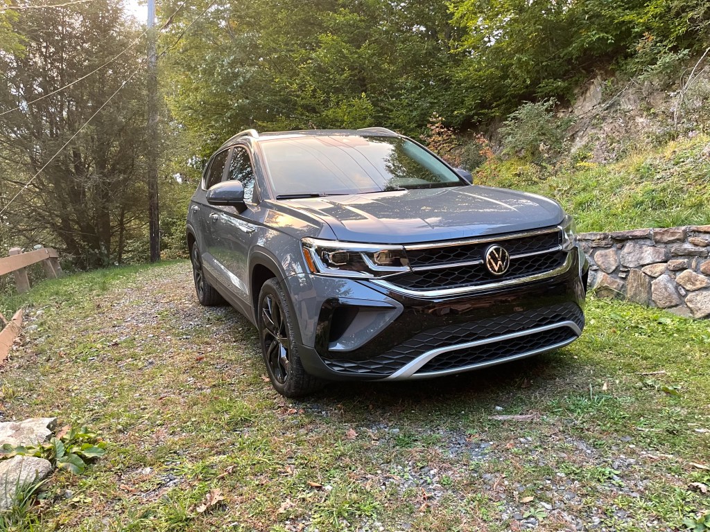 The 2022 Volkswagen Taos parking in gravel