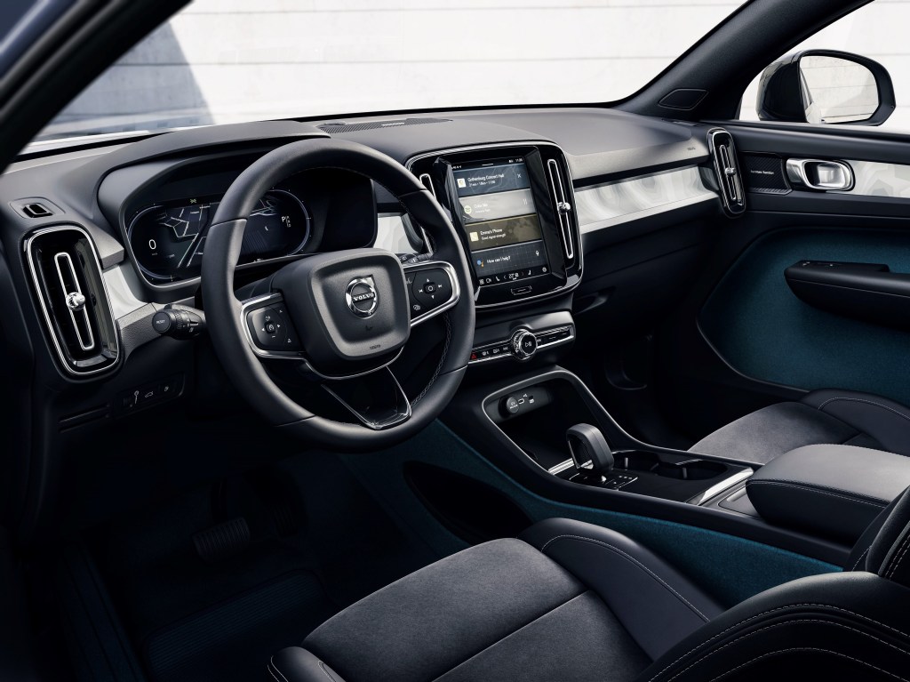 A 2022 Volvo XC40 Recharge's blue-and-black leather-free materials and recycled plastic front interior