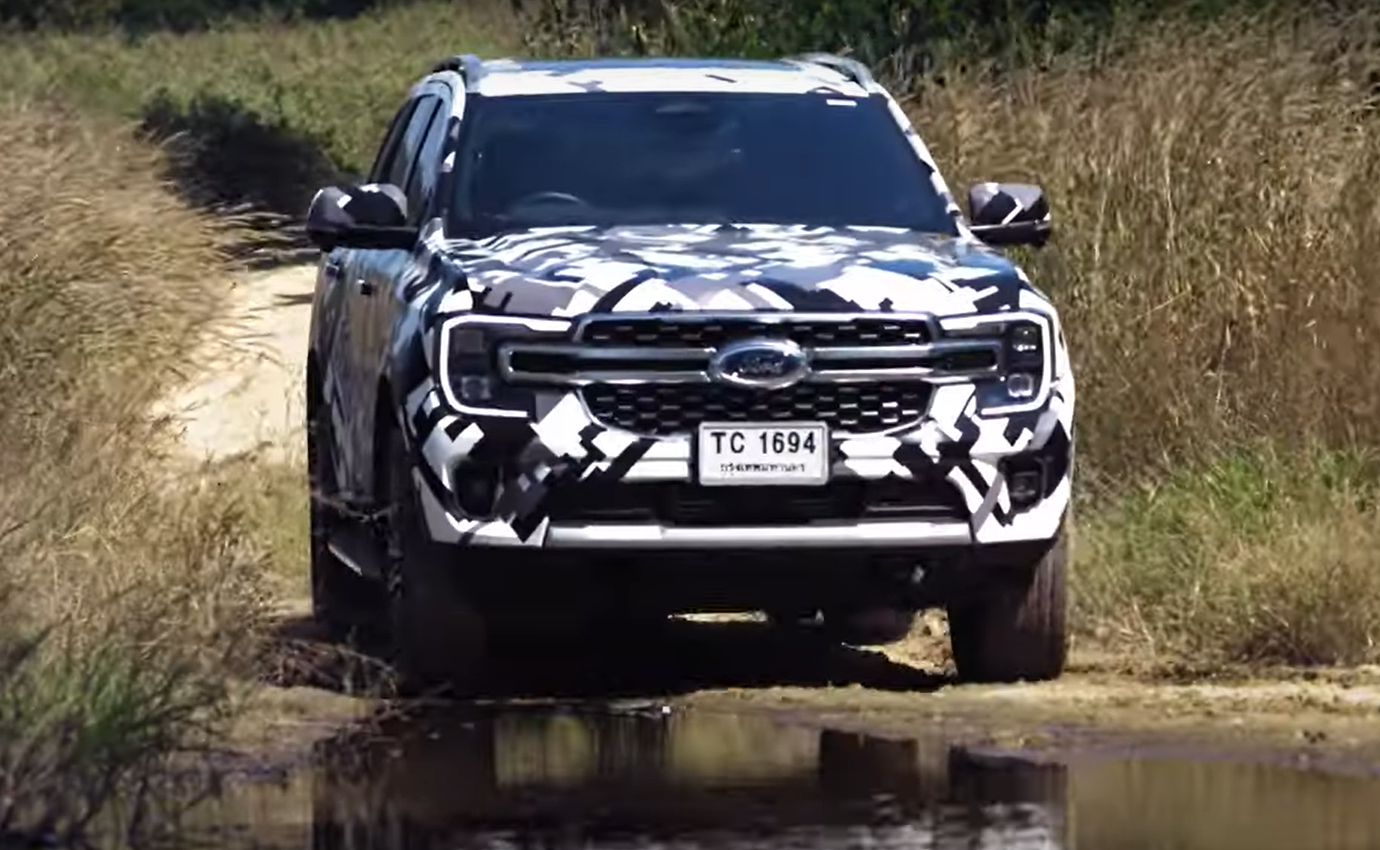 2023 Ford Everest, an SUV version of the Ranger, driving through water