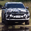 2023 Ford Everest, an SUV version of the Ranger, driving through water