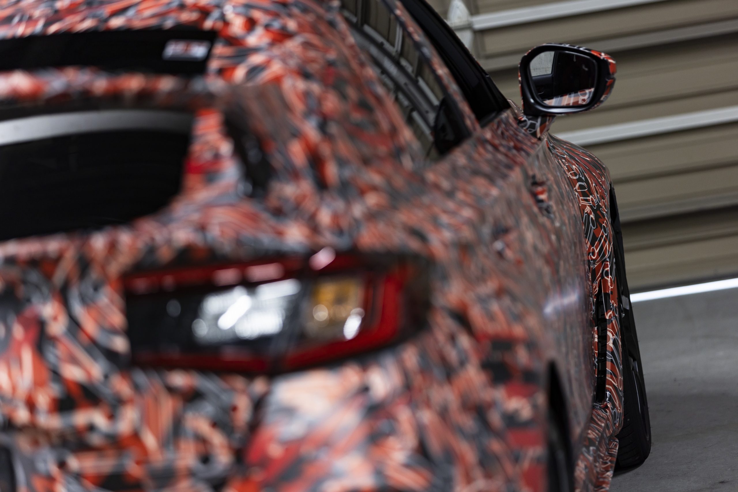 A tight shot down the side of the new Civic Type R hot hatch with a camo livery