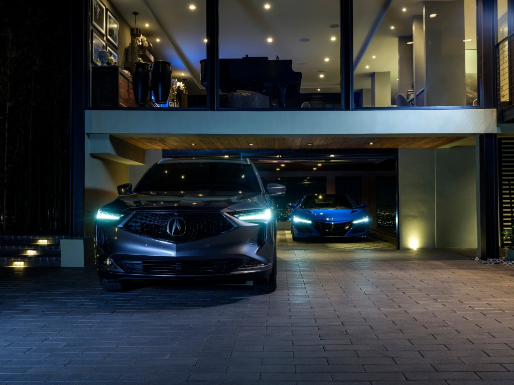 A 2022 Acura MDX Type S Advance performance crossover parked by a house with an NSX, are the many features worth the price?
