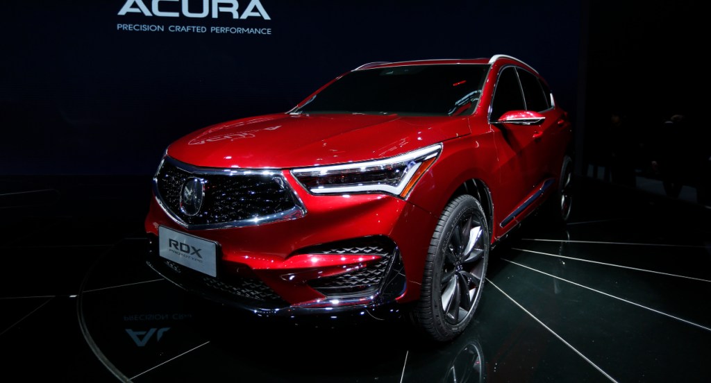 A red Acura RDX is on display.