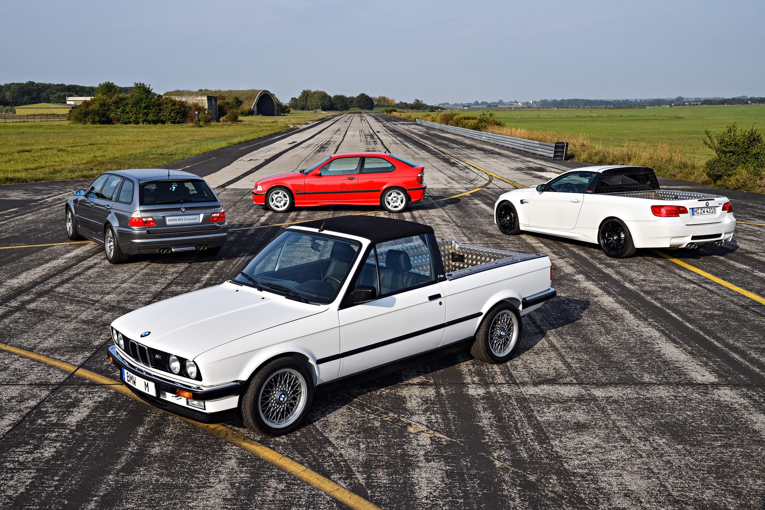 A group of prototype M3 models, including an E30 truck