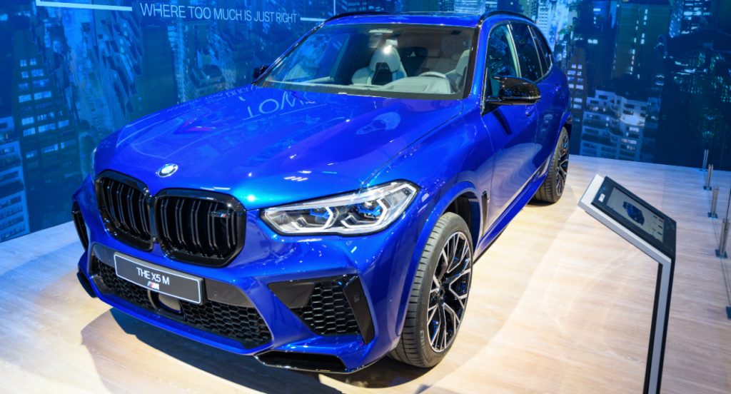 A blue 2022 BMW X5 midsize luxury SUV model.