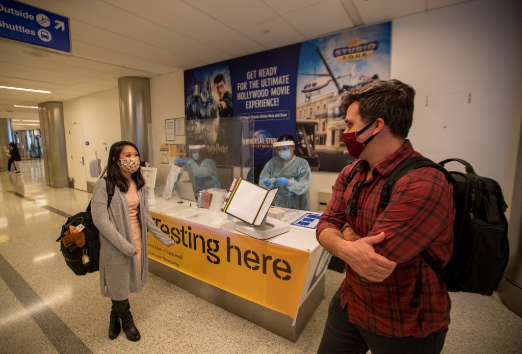Getting tested for COVID during holiday travel | Allen J. Schaben / Los Angeles Times via Getty Images