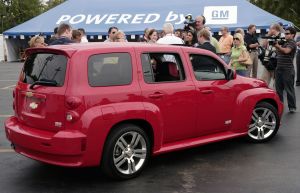 A Chevrolet HHR retro-styled compact station wagon model with red paint color option at its unveiling in Royal Oak, Michigan
