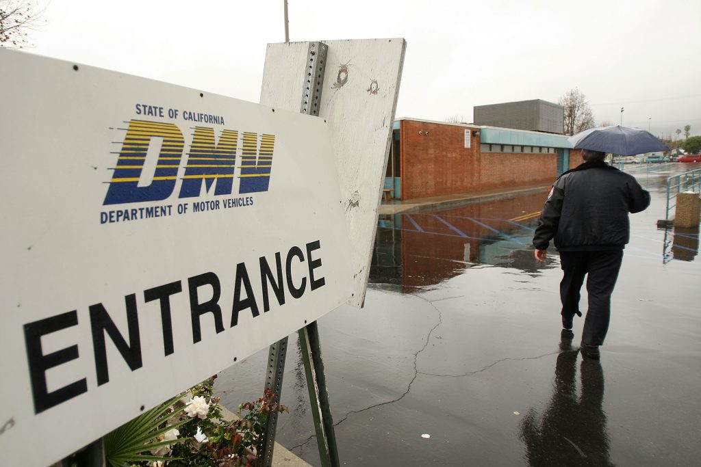 The entrance sign for a DMV.