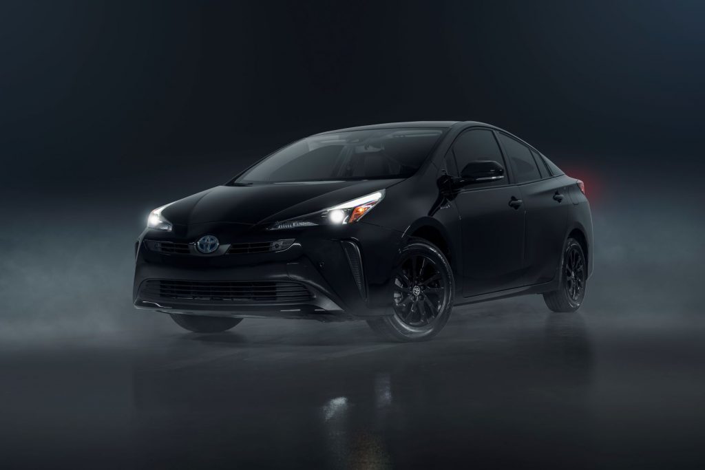 Driver's side front angle view of black 2022 Toyota Prius, a good non-EV to save money on gas