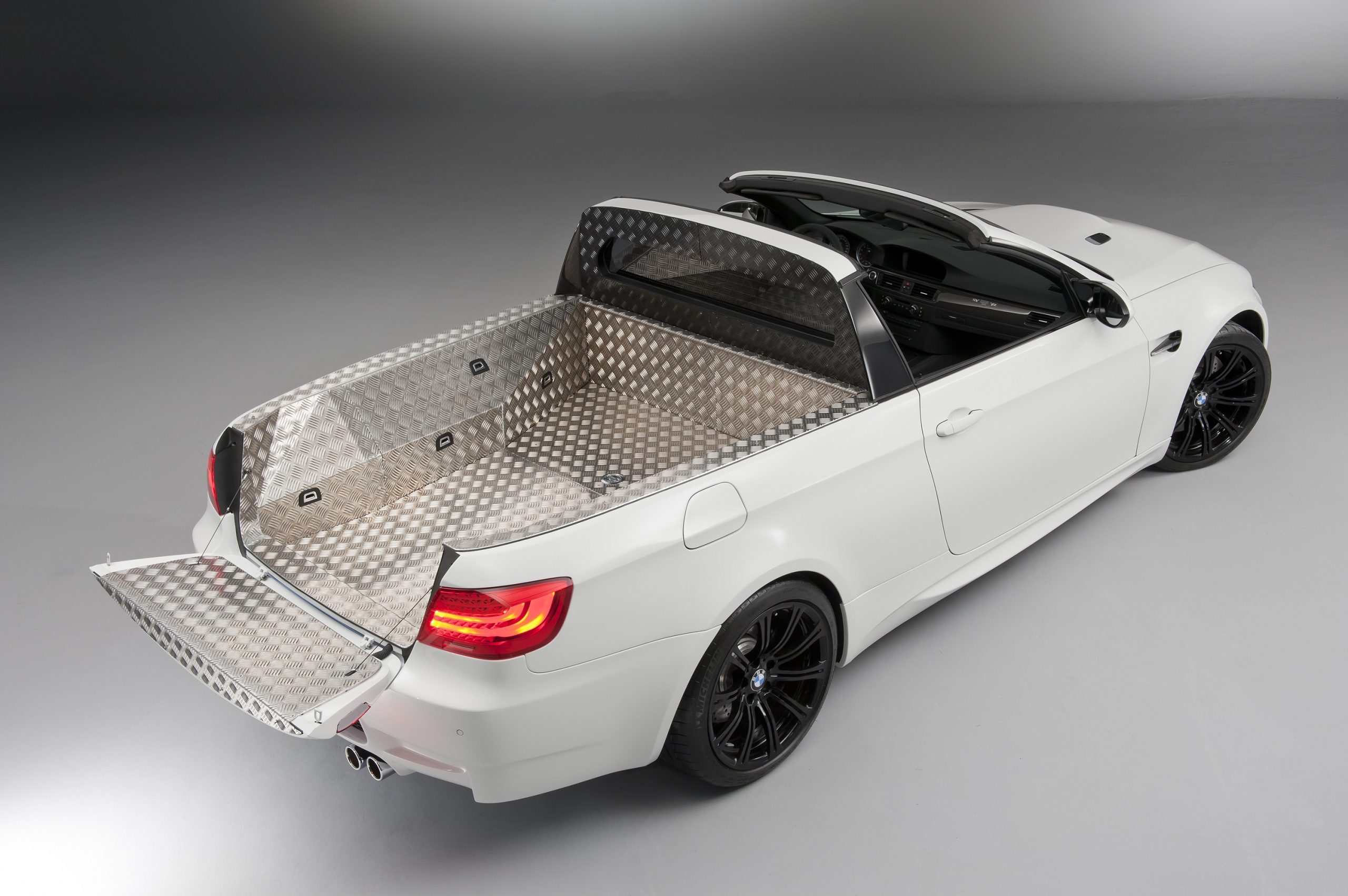 A rear 3/4 shot of the BMW M3 pickup truck/sports car