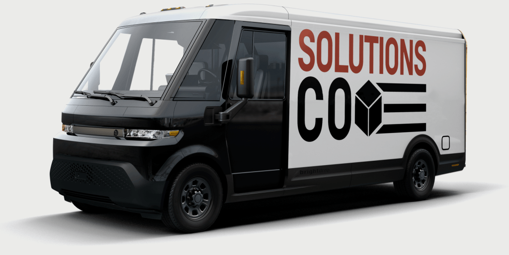A black and white BrightDrop EV600 from GM, an electric deliver van that will soon take over FedEx.