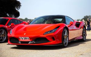 A Ferrari F8 Tributo sports car model with a red paint color option at the Blenheim Palace in Woodstock, United Kingdom
