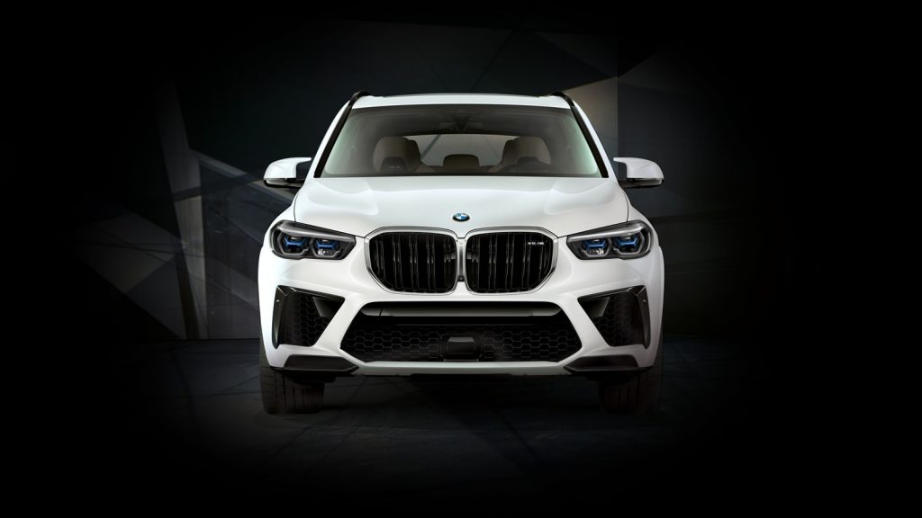 Front view of a fully loaded new white 2022 BMW X5 M