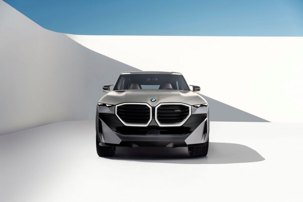 Front view of silver 2023 BMW XM, with info on release date, price, and specs