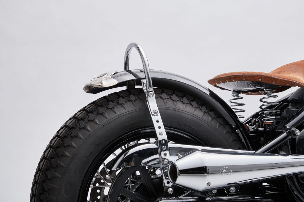 The side view of Go Takamine's custom 2022 Indian Super Chief Limited's chrome rear fender and sissy bar