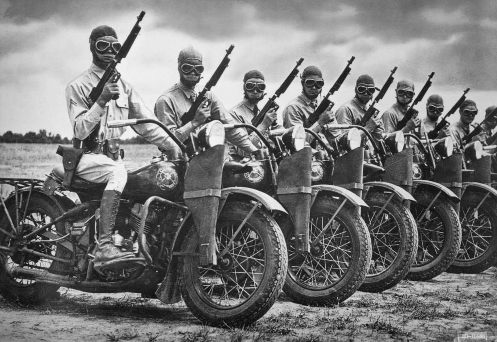 The Harley- Davidson Motor Co. built more than 90,000 motorcycles during World War II for the armed forces. A row of Army Armored Division contingency of mounted soldiers made and impressive sight | Getty Images