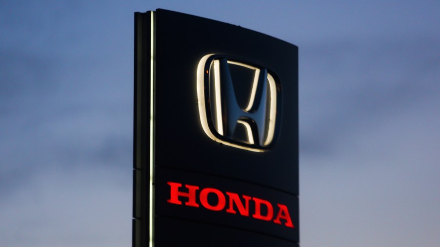 A black Honda logo is seen near the car showroom in Krakow, Poland.