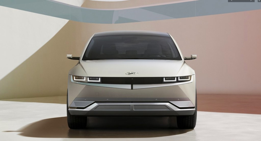 A white 2022 Hyundai Ioniq 5 electric SUV is parked. 