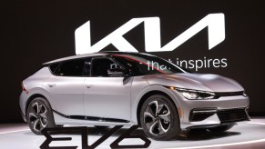 A silver 2022 Kia EV6 is on display.