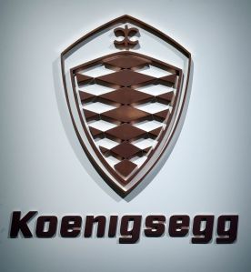 The Koenigsegg logo, badging, and letter at the 89th Geneva Motor Show in 2019