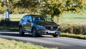 A black Mazda CX-5 compact SUV model.