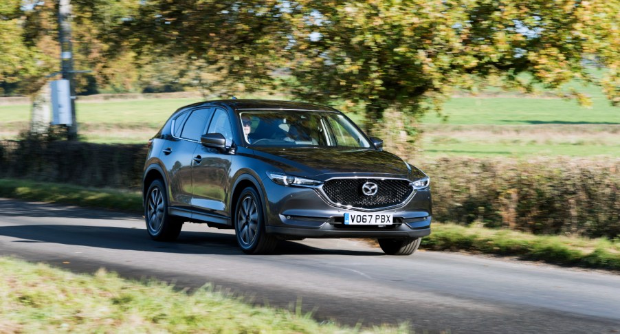 A black Mazda CX-5 compact SUV model.