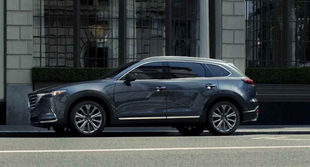 A gray 2022 Mazda CX-9 is parked on the street.