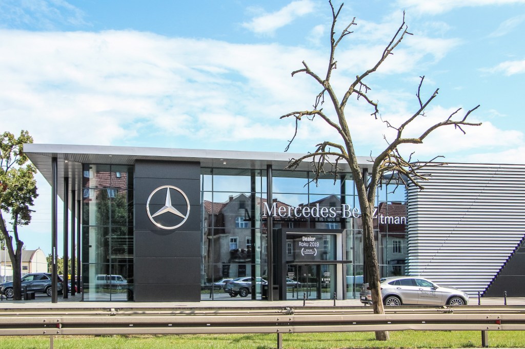 The outside of a Mercedes-Benz dealership, how can you get the best used car deal right now