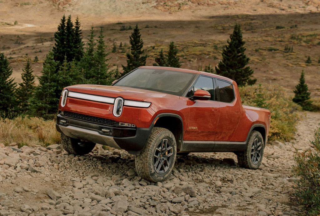 Red Canyon 2022 Rivian R1T driving on a rocky path, showing off its one huge advantage