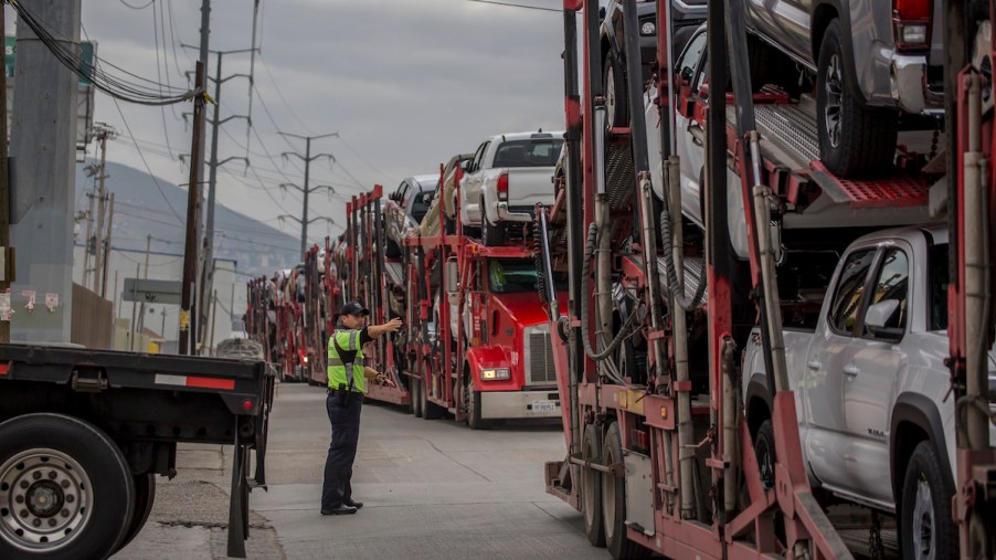 Trucks carrying cars queue in front of the Otay Mesa border crossing in Tijuana in 2019