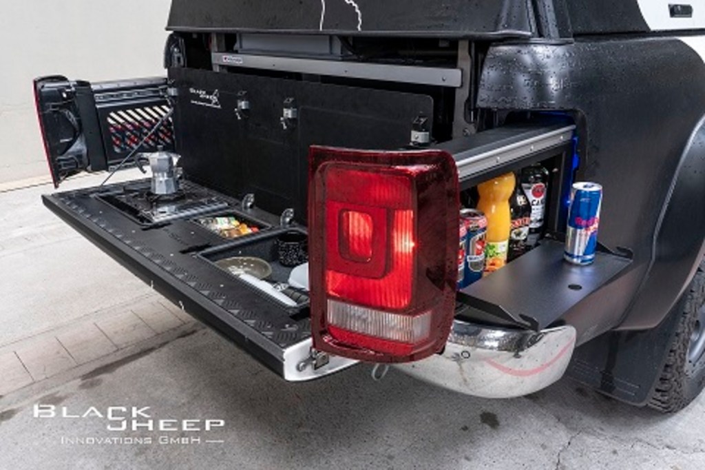 Black Sheep Innovations shows off its gun storage secret compartment inside the taillight of a Toyota Hilux pickup truck.