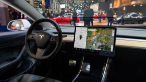 The interior of a Tesla Model 3 with giant screen