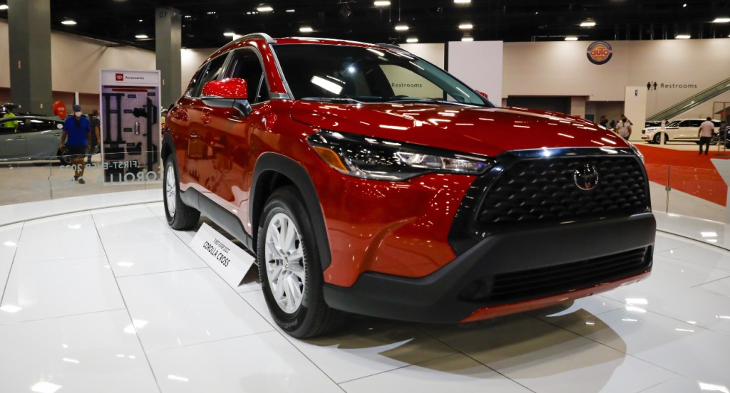 A red 2022 Toyota Corolla Cross is on display. 