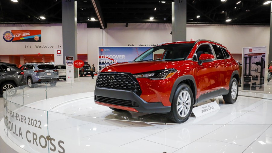 A red 2022 Toyota Corolla Cross is on display.