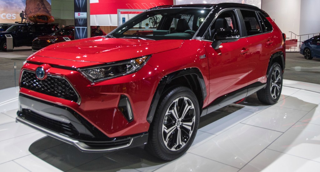 A red 2022 Toyota RAV4 Prime is on display.