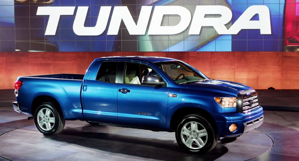 A blue Toyota Tundra is on display.