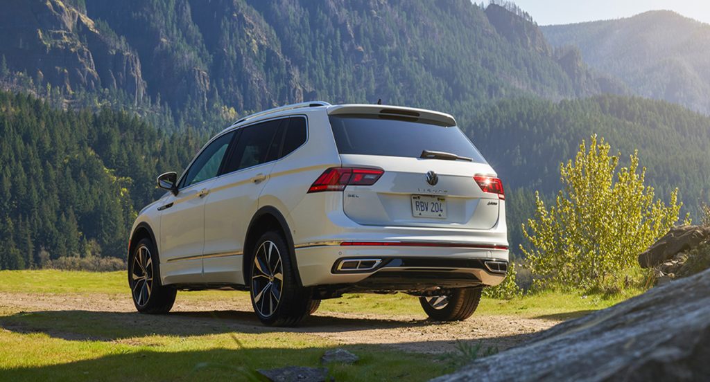 A white 2022 Volkswagen Tiguan is in nature.