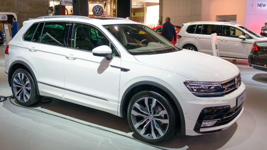 A white Volkswagen Tiguan is on display.
